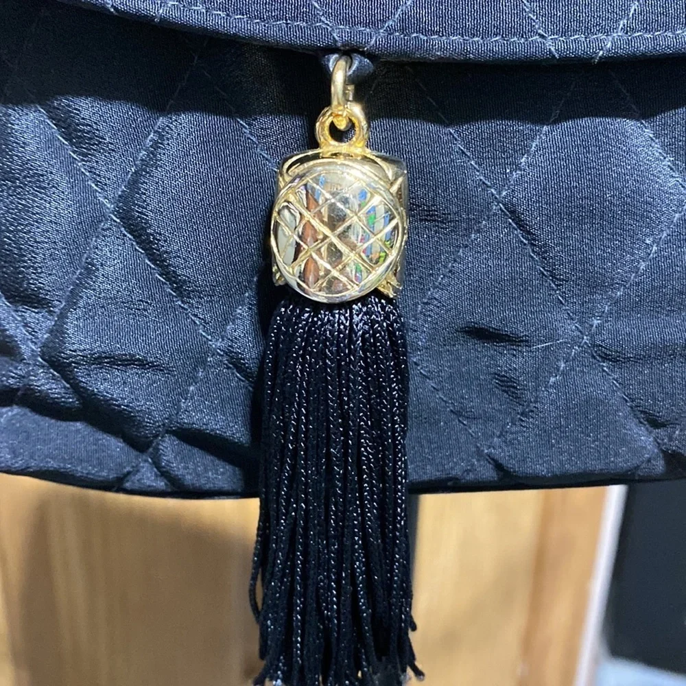 Neiman Marcus Gold Tassel Bag Small
Luxury purse​​ - Picture 10 of 11